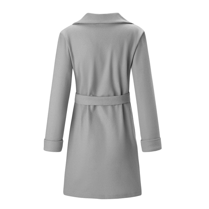 Long double-breasted women's winter coat. Elegant wool-look fabric for classic fall and winter fashion.