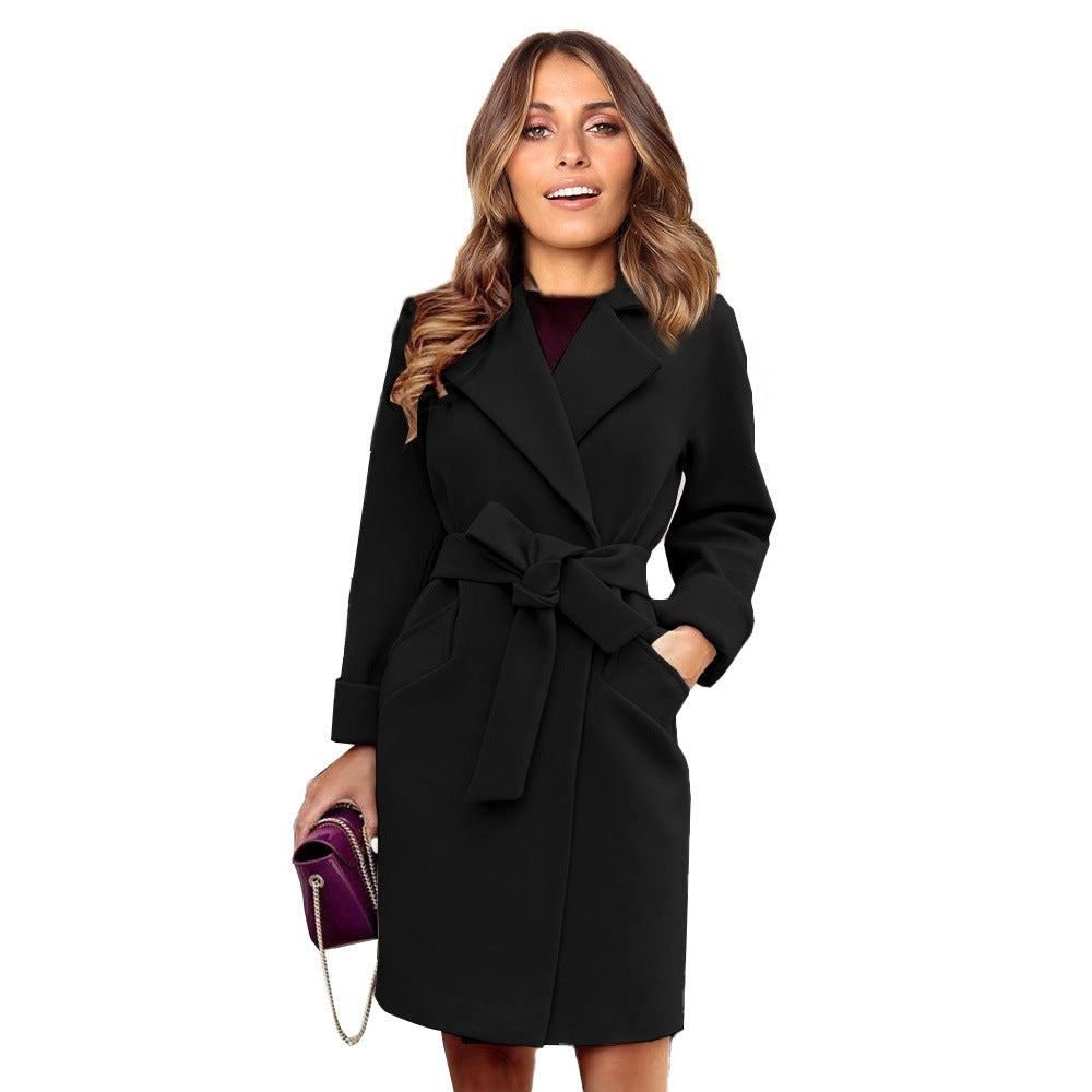 Black women's elegant long double-breasted wool-look winter coat, perfect for sophisticated seasonal warmth.