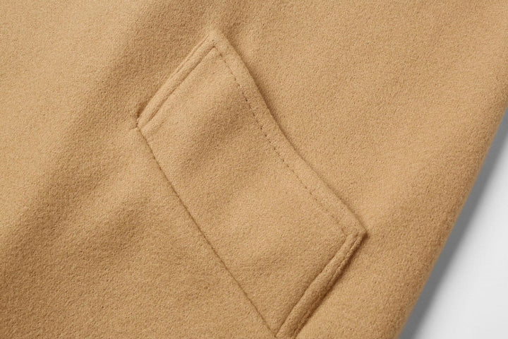 Gray women's elegant long double-breasted winter coat. Classic style, warm wool-look for fall fashion.