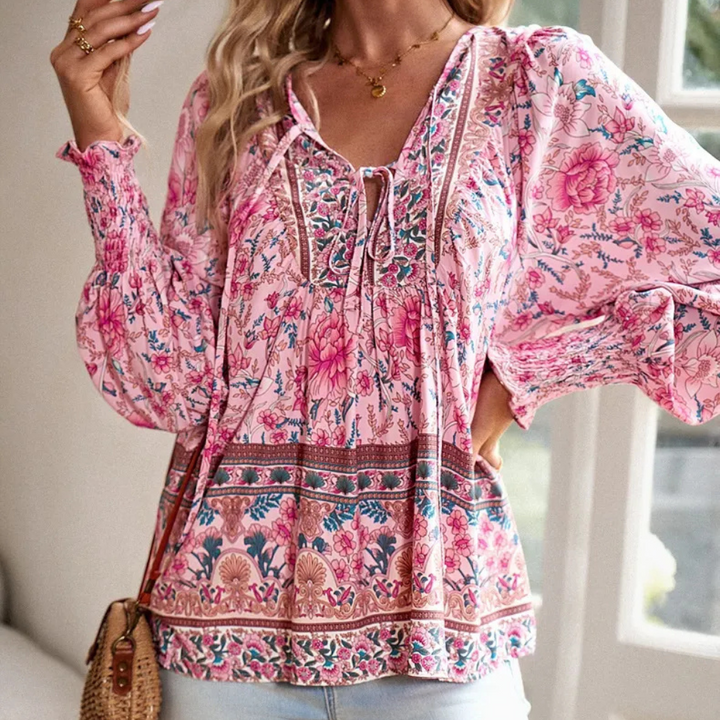 Chic women's floral print blouse, a versatile long-sleeve top for elegant casual & feminine fashion.