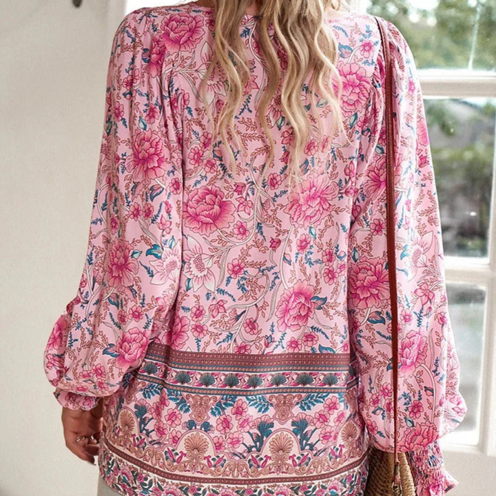 Feminine long-sleeve floral print blouse for women, offering elegant style for casual chic wear.