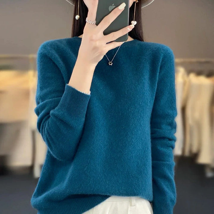 Slim fit women's knit sweater, soft long sleeve design for a classic and elegant look.