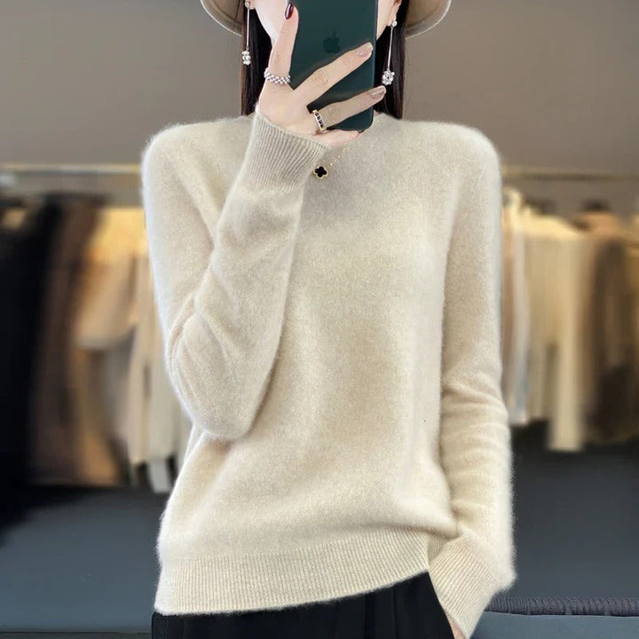 Elegant women's long sleeve knit sweater, ideal for cozy fall & winter fashion.