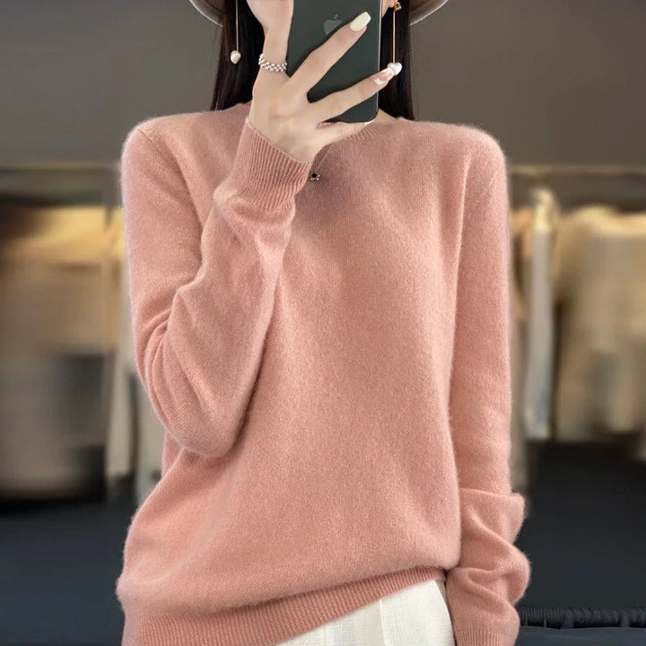 Classic women's long sleeve knit sweater, elegant slim fit top for versatile winter fashion.