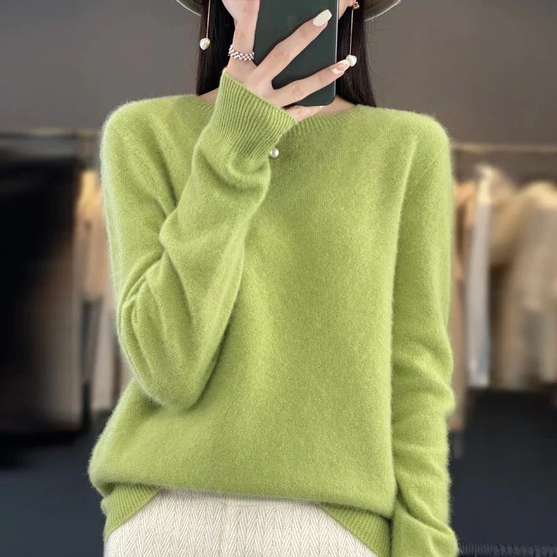Women's elegant long sleeve knit top, a versatile and comfortable sweater for cooler seasons.