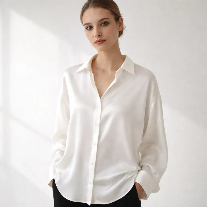 Chic women's long sleeve blouse for office wear. Loose fit, elegant design perfect for professional workwear.