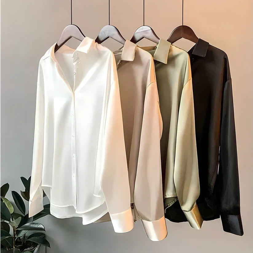 Versatile women's loose fit long sleeve blouse. Elegant office top offering comfort & professional style.