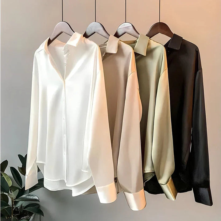 Versatile women's loose fit long sleeve blouse. Elegant office top offering comfort & professional style.