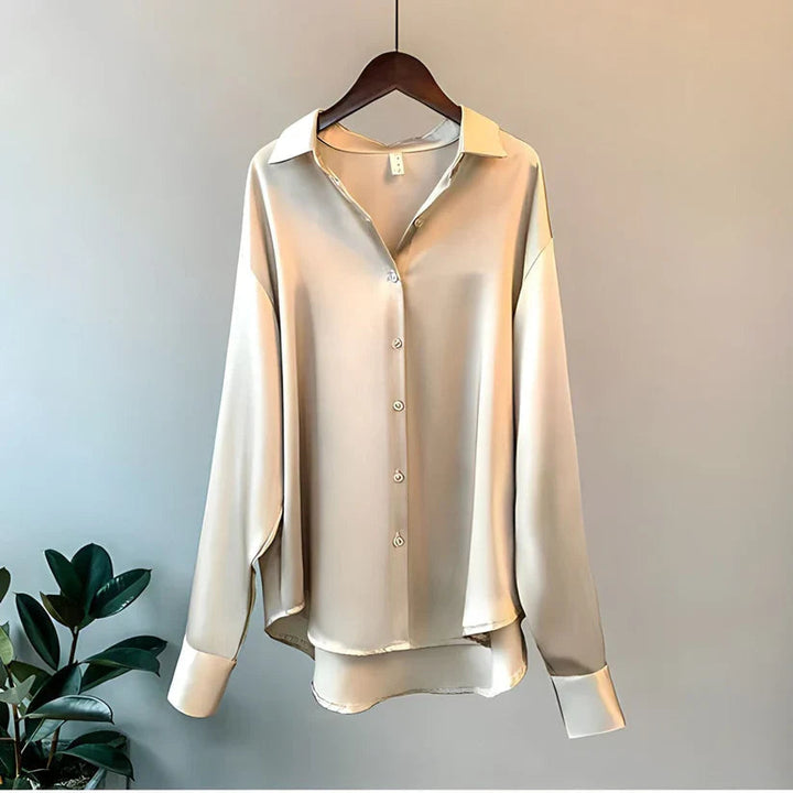 Professional women's elegant long sleeve blouse, perfect for work. Loose & comfortable, a chic addition to office wear.