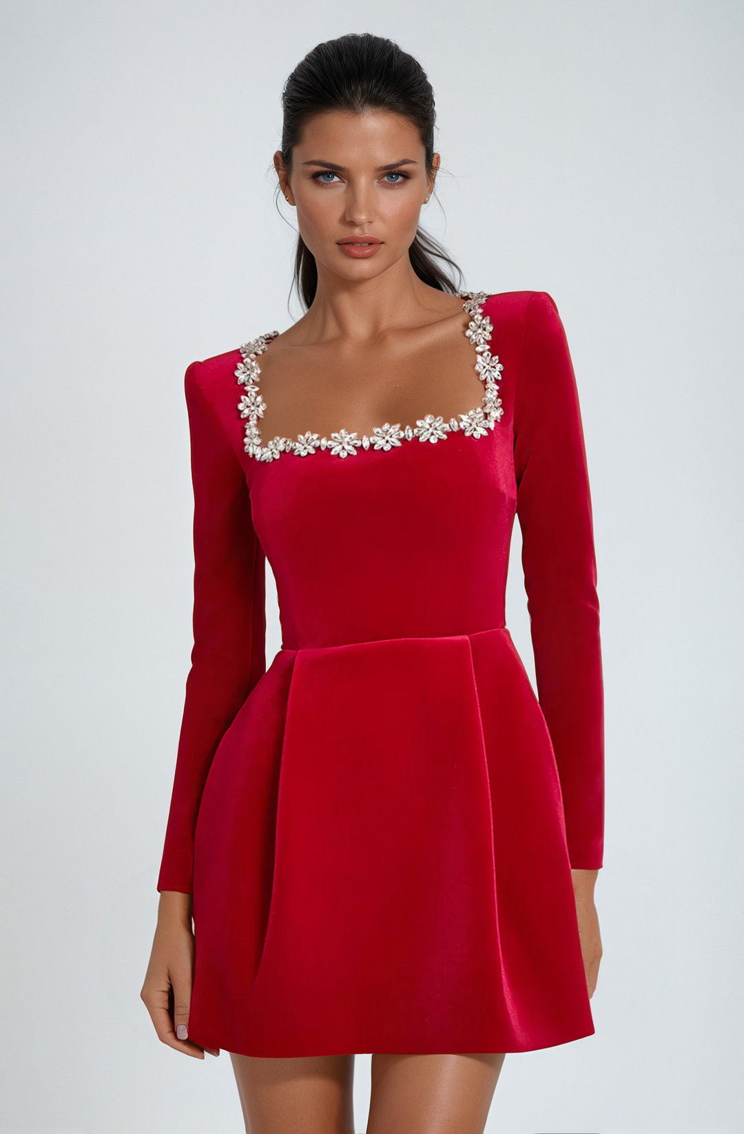Glamorous long sleeve mini dress with crystal accents. Perfect for special occasions & evening wear.