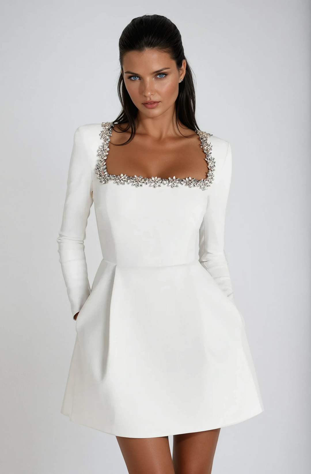 Women's long sleeve crystal cocktail mini dress. Stylish square neckline for wedding guests.