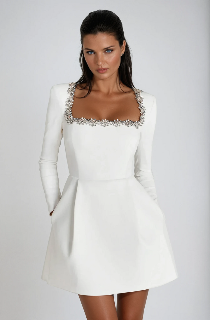 Women's long sleeve crystal cocktail mini dress. Stylish square neckline for wedding guests.