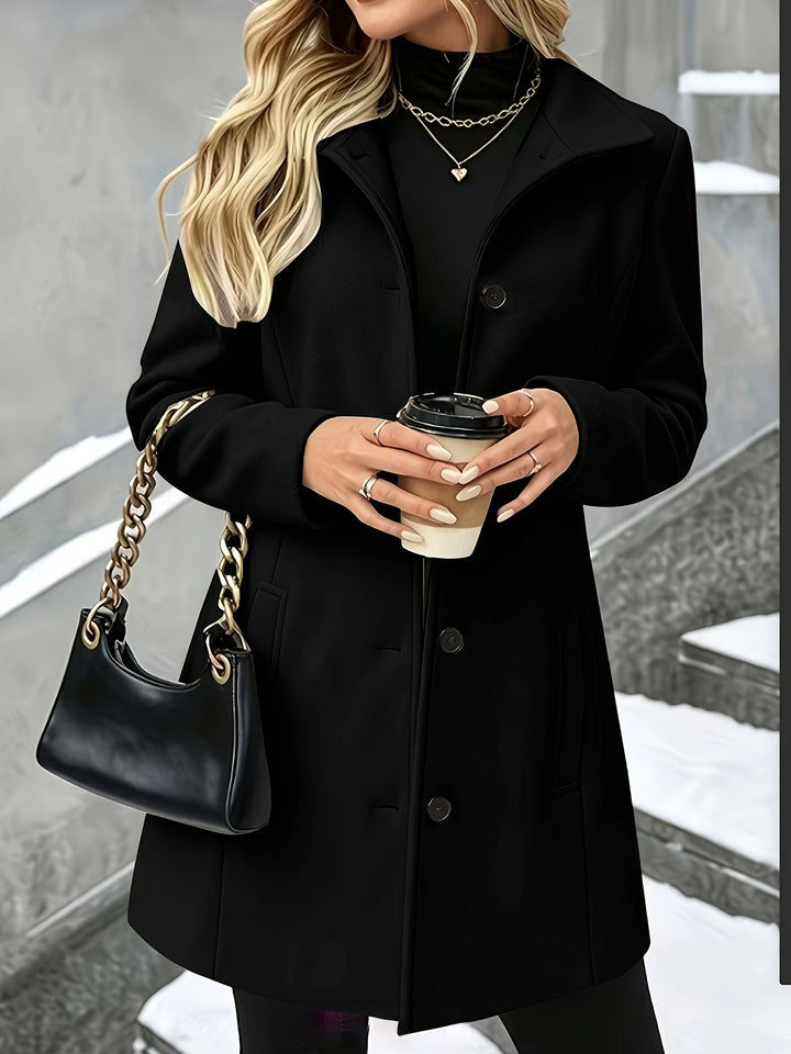 Black women's elegant longline coat, a chic winter jacket with a sophisticated notch collar design.