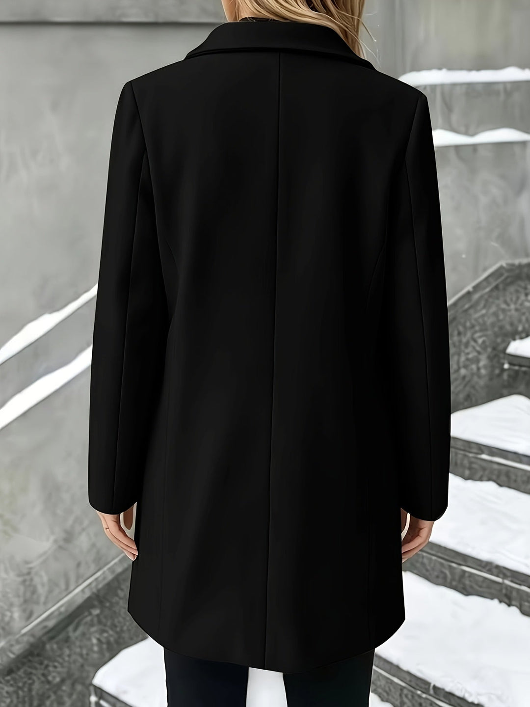 Women's single-breasted longline coat with a sophisticated notch collar. Elegant fall & winter fashion.