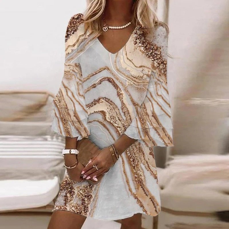 Women's elegant marble swirl mini dress with flowing flare sleeves, perfect for stylish summer parties.