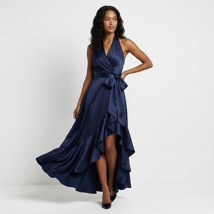 Flowing women's elegant maxi dress with tie-waist bow, ideal for a refined party or evening look.