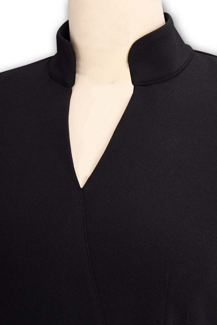 Versatile women's midi dress. Elegant sheath cut with a mandarin collar and a defining belt. Modern fashion.