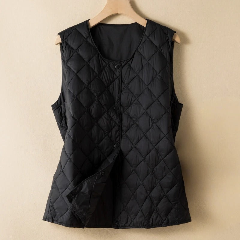 Chic women's minimalist vest, an elegant layering piece. Versatile sleeveless design for modern fashion.