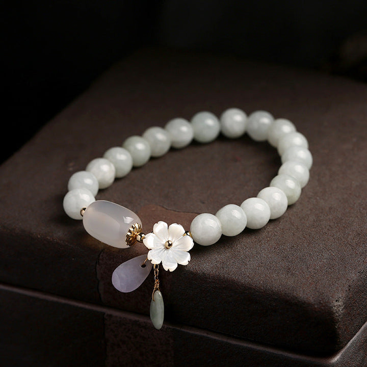 Women's elegant natural jade and agate stone bracelet. Handmade jewelry featuring genuine gemstones.