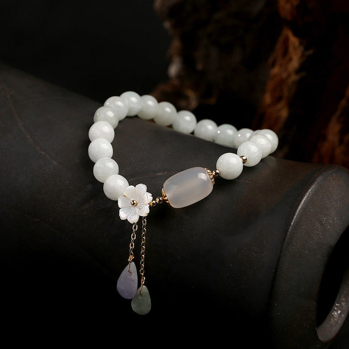 Polished natural jade and agate gemstone bracelet for women. A beautiful, elegant accessory.