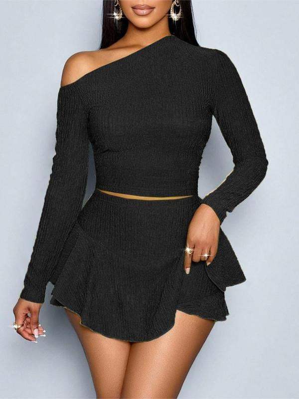 Women's elegant one-shoulder two-piece set with bodycon mini skirt. Stylish & flattering stretch fabric.