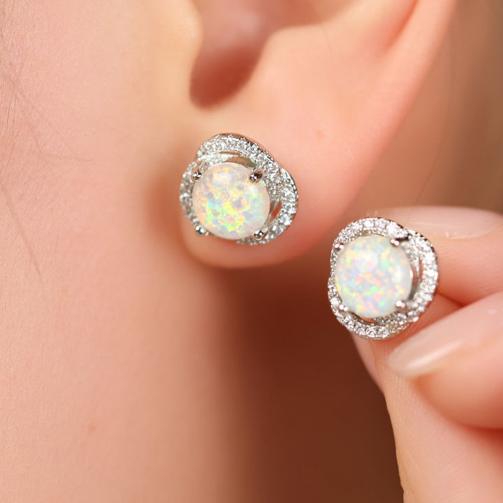 Elegant women's jewelry gift: white opal & zircon clover leaf stud earrings.