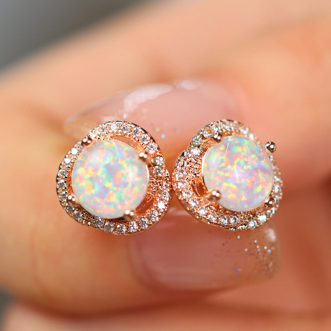 Women's lucky charm clover leaf earrings, featuring brilliant opal & zircon stones.