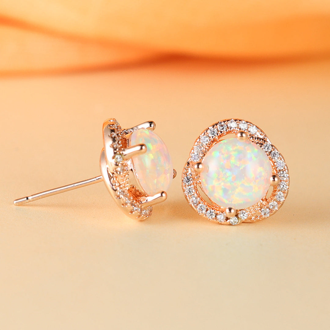 Beautiful women's silver tone clover stud earrings with sparkling opal & zircon.