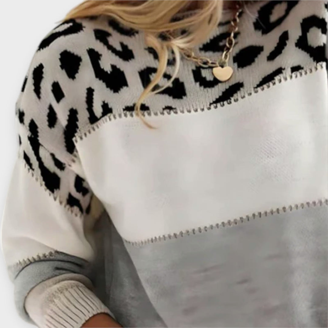 Chic long sleeve women's sweater with a striking panther print, ideal for casual or dressy wear.