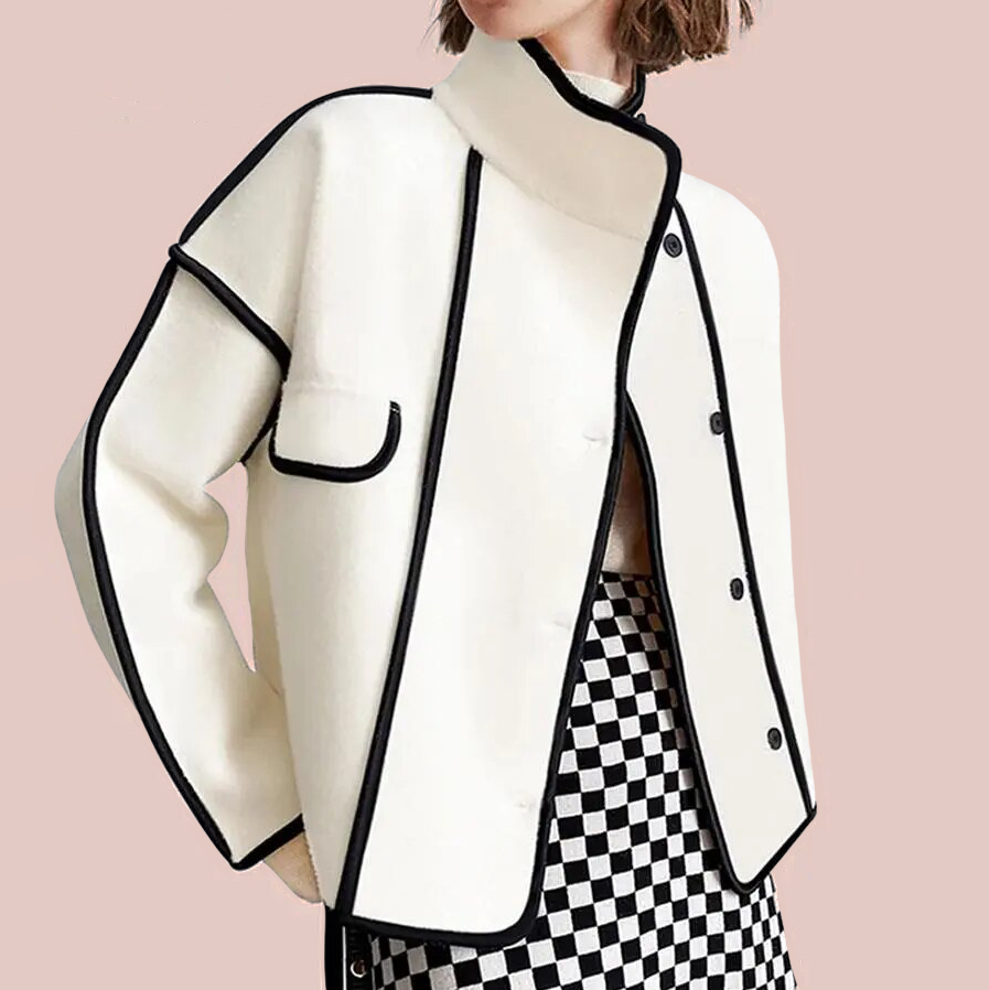 Women's elegant piped insulated jacket in a sophisticated design, perfect for warmth and style. Chic outerwear.