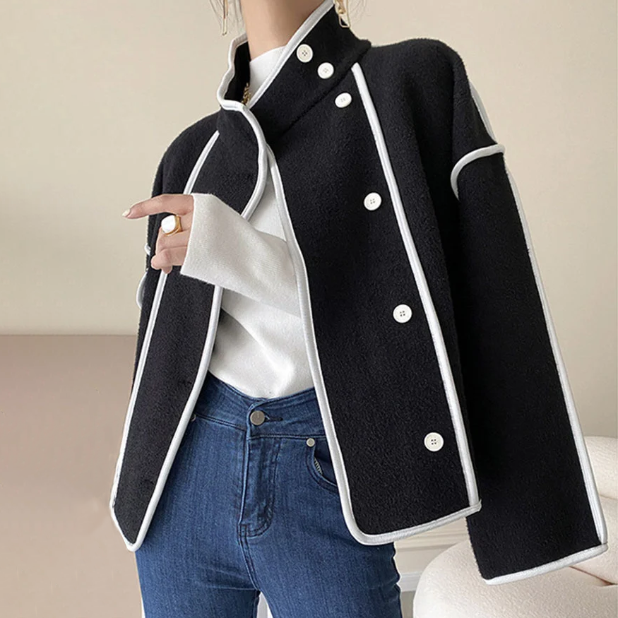 Back view of women's elegant piped insulated jacket, highlighting its sophisticated cut and flattering silhouette. Warm outerwear.