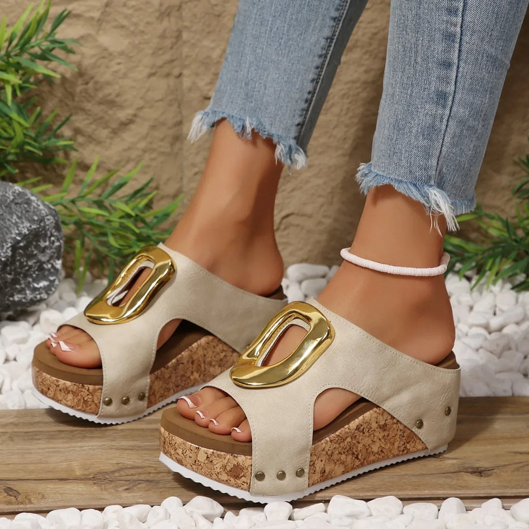 Women's elegant platform wedges, comfortable summer sandals with stylish gold details.