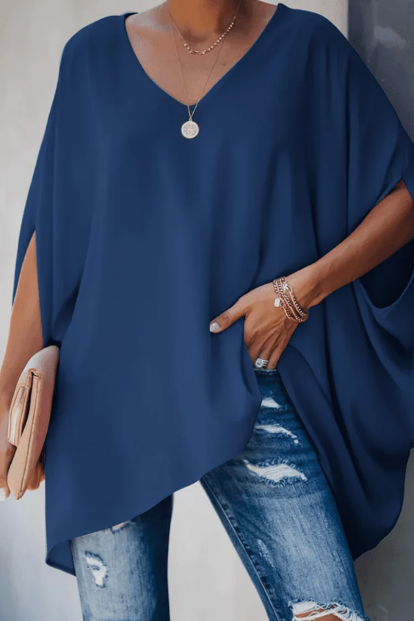 Colorful women's chic pleated blouse with a V-neck. A stylish short sleeve top for versatile spring & summer fashion.