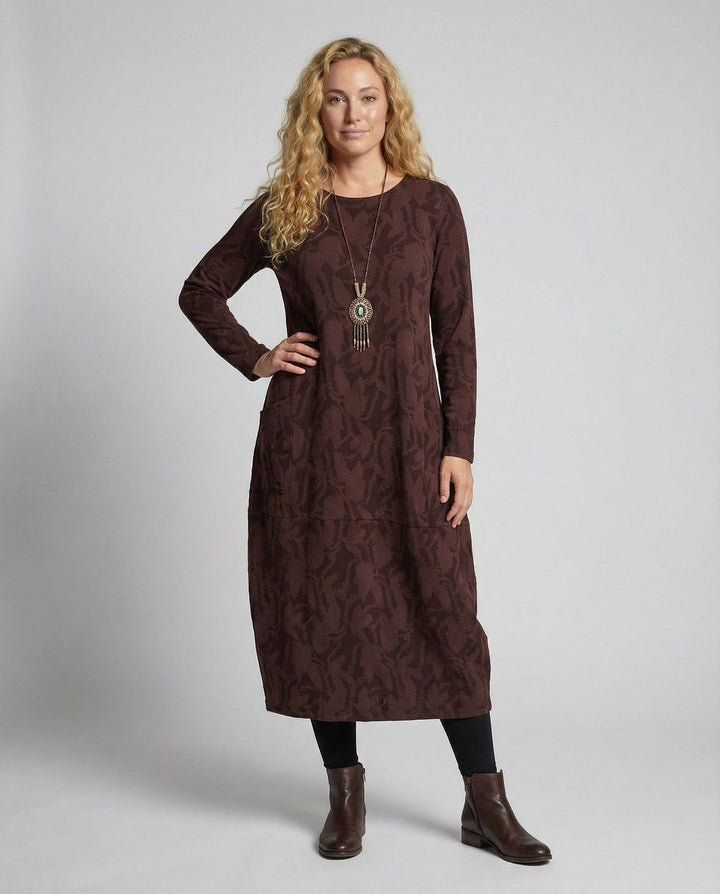 Women's elegant printed midi dress with long sleeves, perfect for chic day or evening wear.