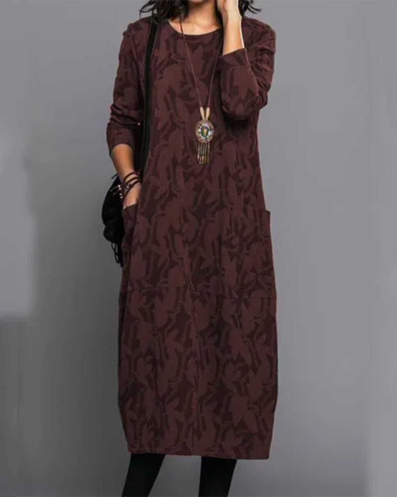 Chic women's long-sleeve midi dress with a unique elegant print. Ideal for versatile womenswear.
