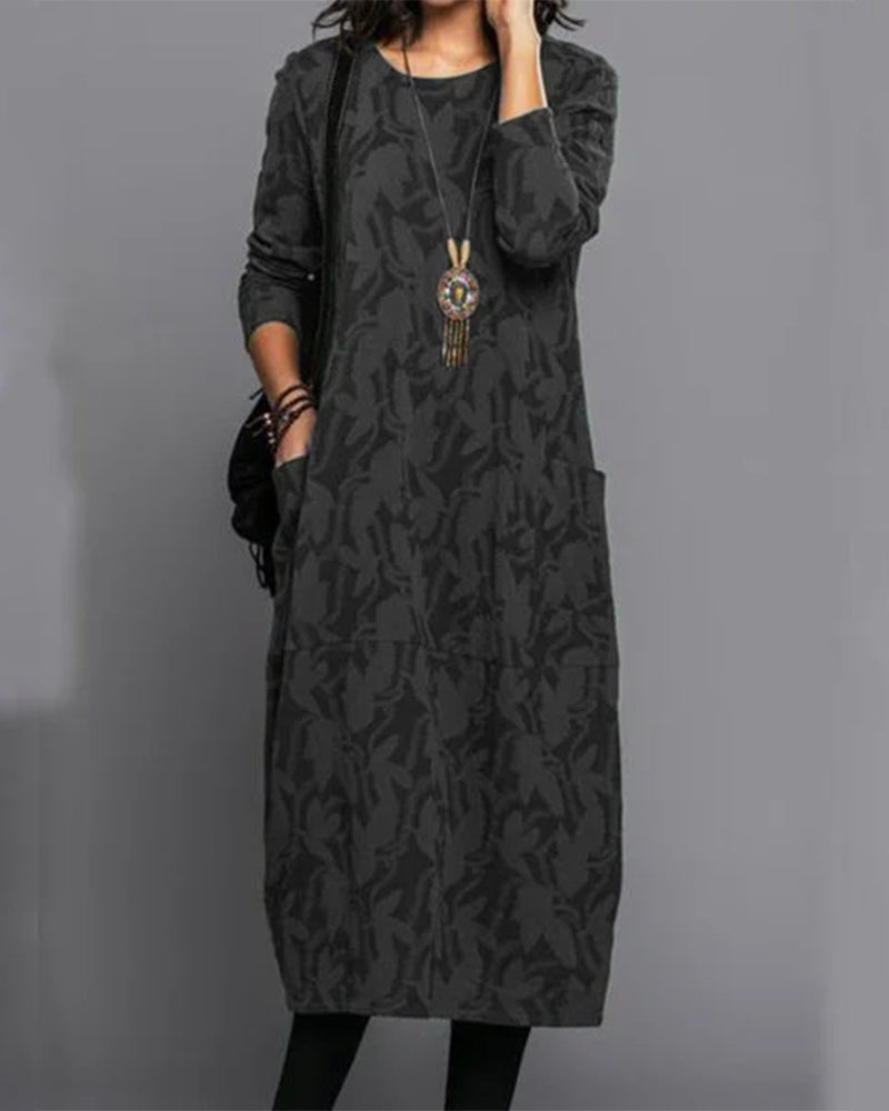 Fashionable women's elegant printed midi dress, a chic long-sleeve design for modern womenswear.