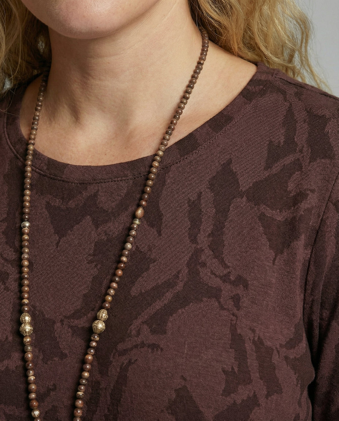 Elegant printed long-sleeve midi dress for women, offering chic style, comfort, and versatile fashion.