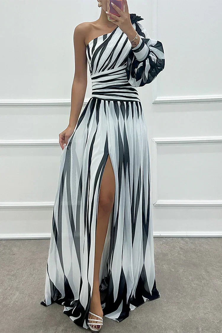 Women's elegant printed one-shoulder maxi dress, perfect for a wedding guest or formal evening occasion.