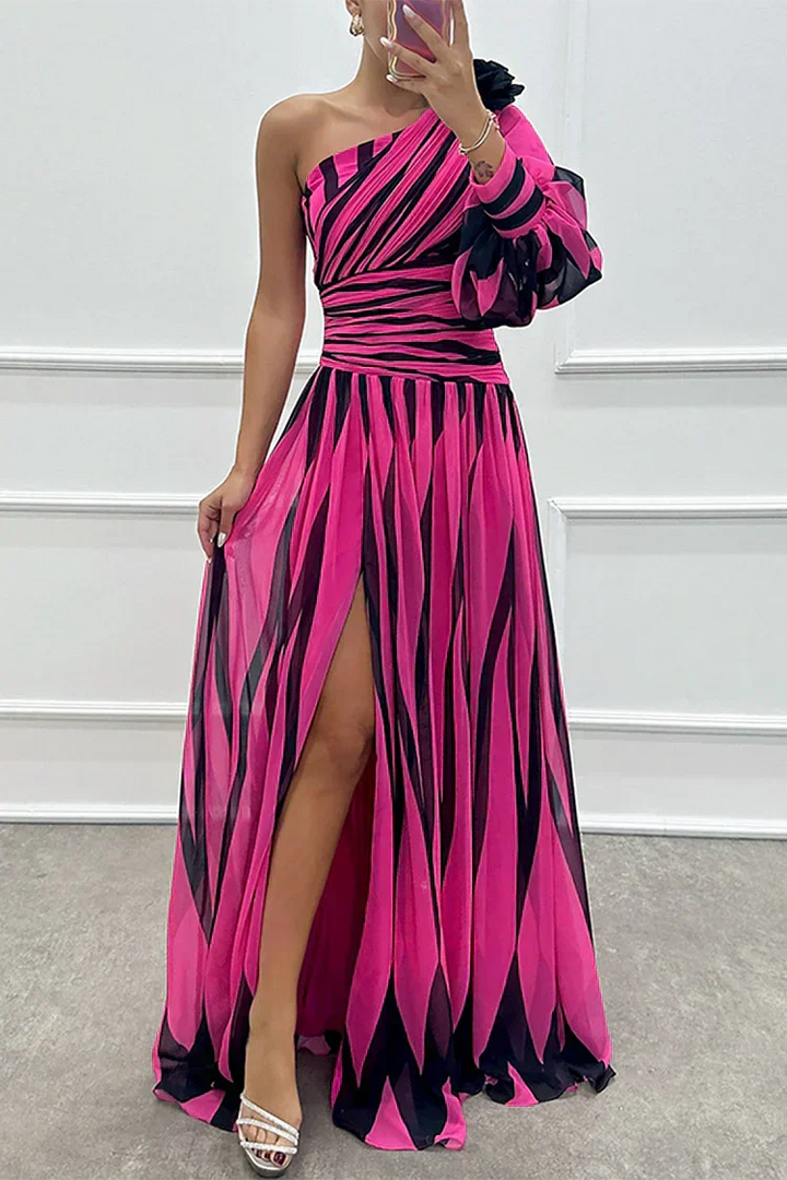 Flowing printed one-shoulder maxi dress for women, an elegant choice as a wedding guest or party dress.