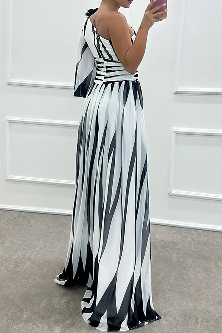 Striking printed one-shoulder maxi dress, an elegant & flattering formal gown for any wedding guest.
