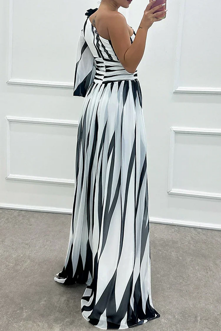 Striking printed one-shoulder maxi dress, an elegant & flattering formal gown for any wedding guest.