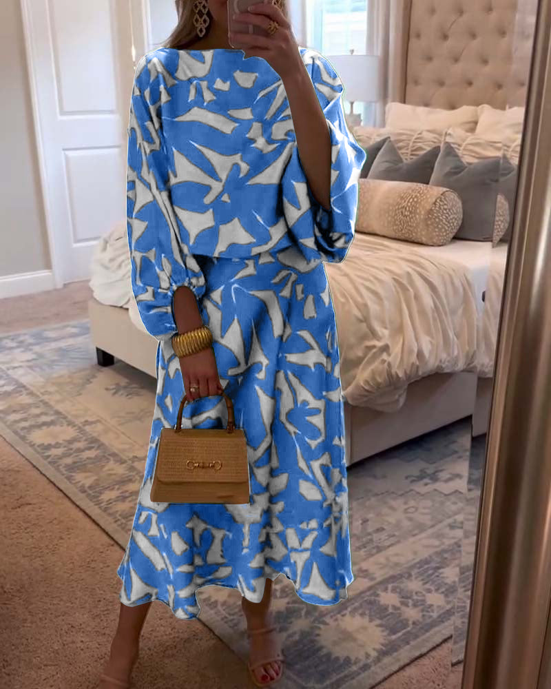 Green printed two-piece outfit with elegant lantern sleeves. Women's casual summer matching set.