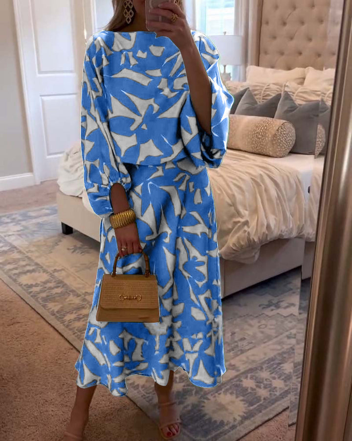 Green printed two-piece outfit with elegant lantern sleeves. Women's casual summer matching set.