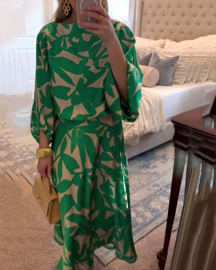 Elegant women's printed two-piece set with stylish lantern sleeves. A chic matching outfit for spring.