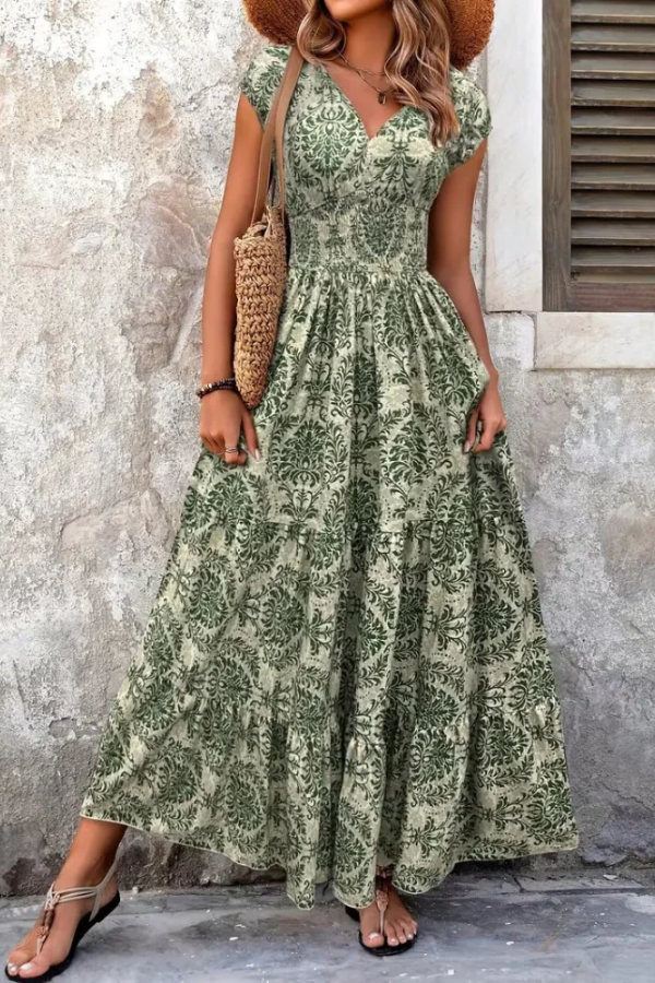 Casual women's long printed V-neck dress for effortless style & comfort. Ideal for beach or everyday wear.