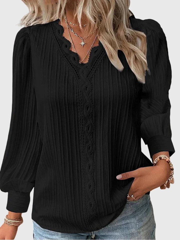 Chic women's elegant pullover shirt, a stylish and comfortable top suitable for office and casual wear.