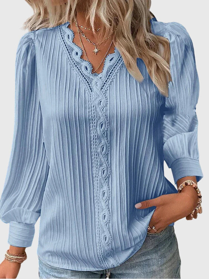 Soft women's elegant pullover top, a stylish and comfortable blouse perfect for versatile fashion.