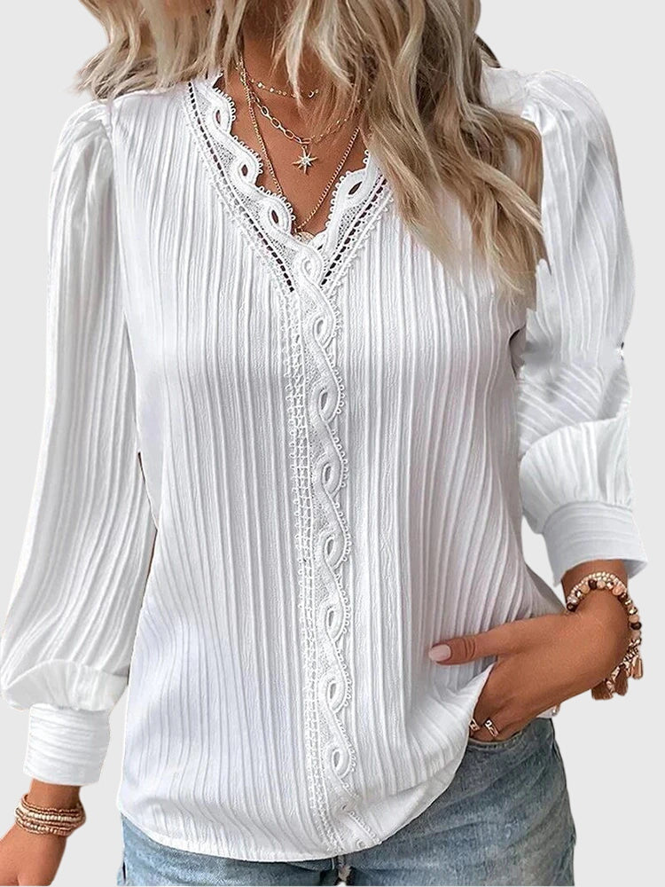 Modern women's elegant pullover top, a timeless and stylish blouse offering versatile fashion for women.