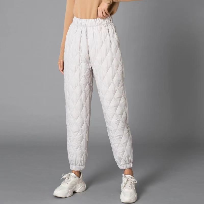Women's elegant quilted jogger pants with diamond stitch for ultimate comfort & style.