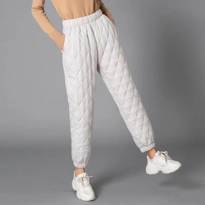 Comfortable women's quilted jogger pants, tapered fit, perfect for casual everyday wear.